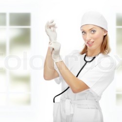 2044046-pretty-female-doctor-putting-on-the-latex-gloves-in-the-clinic-with-big-windows